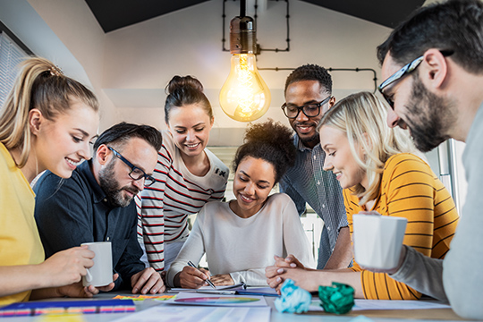 Group of associates collaborating on a project