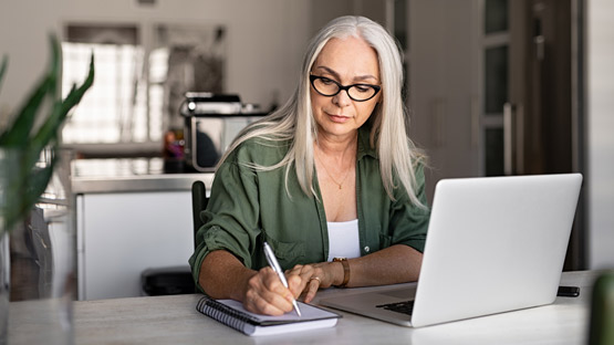 Health Care Provider Taking Notes During A Virtual Visit